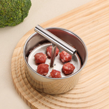 🔥HOT SALE 50% OFF!🍝🧆 Stop rolling meatballs by hand — this stainless steel mould gives you perfect, even portions in seconds. 6 or 12 holes, quick press, flawless results every time. ✨