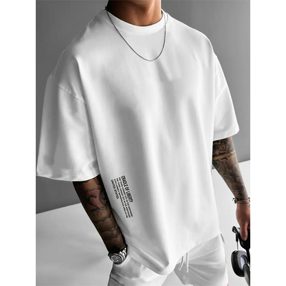 👕 50% OFF NOW! ✨ Men's Loose Fit Short Sleeve Shirt – Premium Cotton Blend, Urban Graphic Print & Oversized Casual Style🏙️