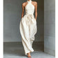 👗 50% OFF NOW! 💫 Elegant Halter Sleeveless Jumpsuit with Waist Tie – Crisscross Neckline, Wide Leg & Deep Side Pockets – Effortless Sophistication ✨