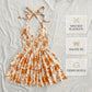 👗🌸 LIMITED TIME 50% OFF! ✨ Women's Halter Tie-Neck Printed Mini Dress – Lace-Up Front, Smocked Back & Tiered Ruffle Skirt 💃